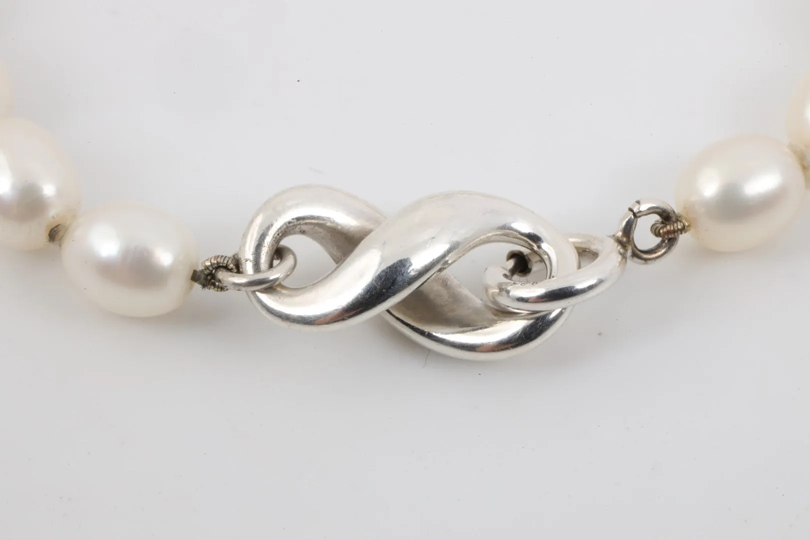 7.5" Tiffany & Co. 925 Silver Infinity Pearl Bracelet (12.02g.)