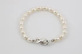 7.5" Tiffany & Co. 925 Silver Infinity Pearl Bracelet (12.02g.)