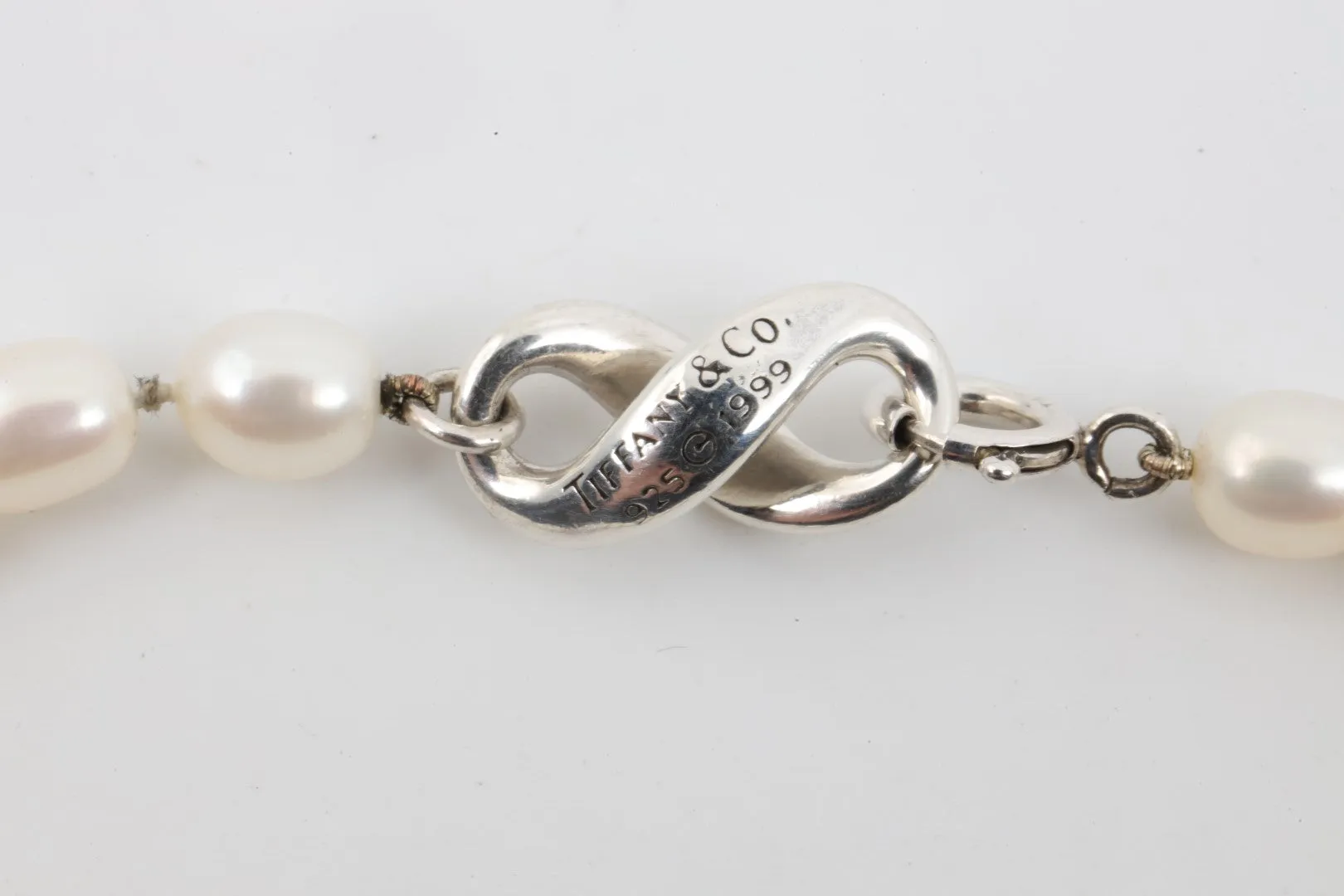 7.5" Tiffany & Co. 925 Silver Infinity Pearl Bracelet (12.02g.)