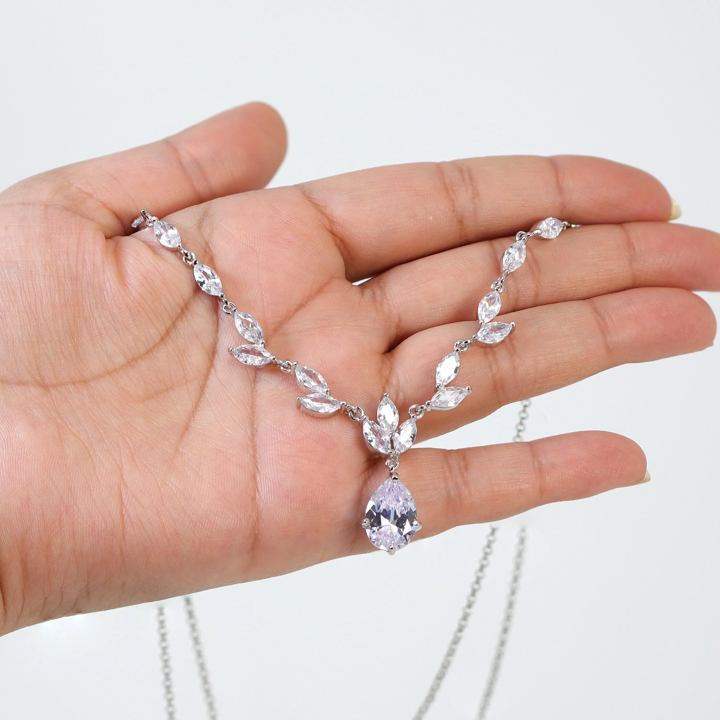 Divine Dewdrops: Swarovski Crystal Vine and Leaf Necklace Set, Statement Earring And Necklace Set, CZ Necklace set