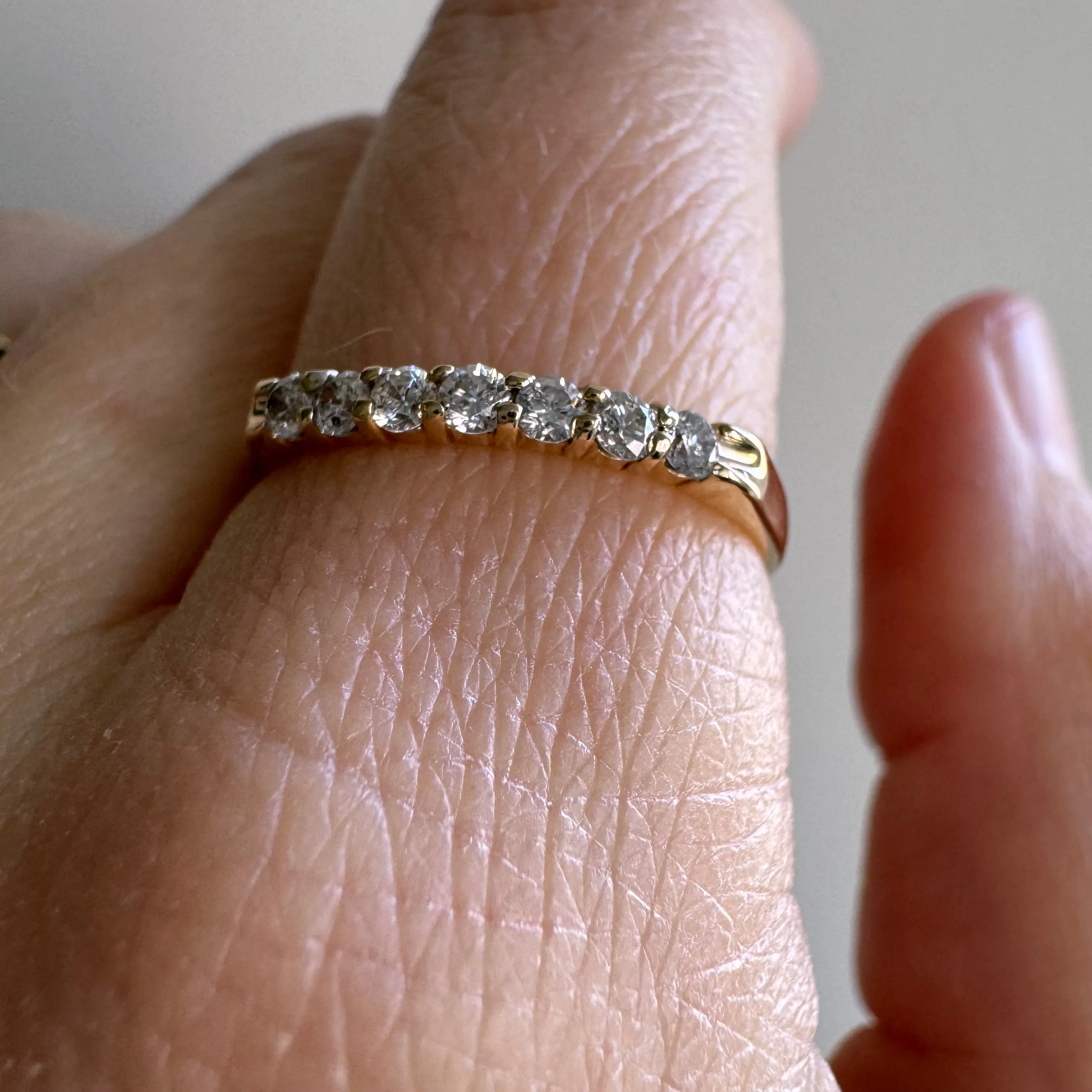 P R E - L O V E D // seven sparkles / 14k yellow gold diamond half eternity band / size 7.25 to 7.5