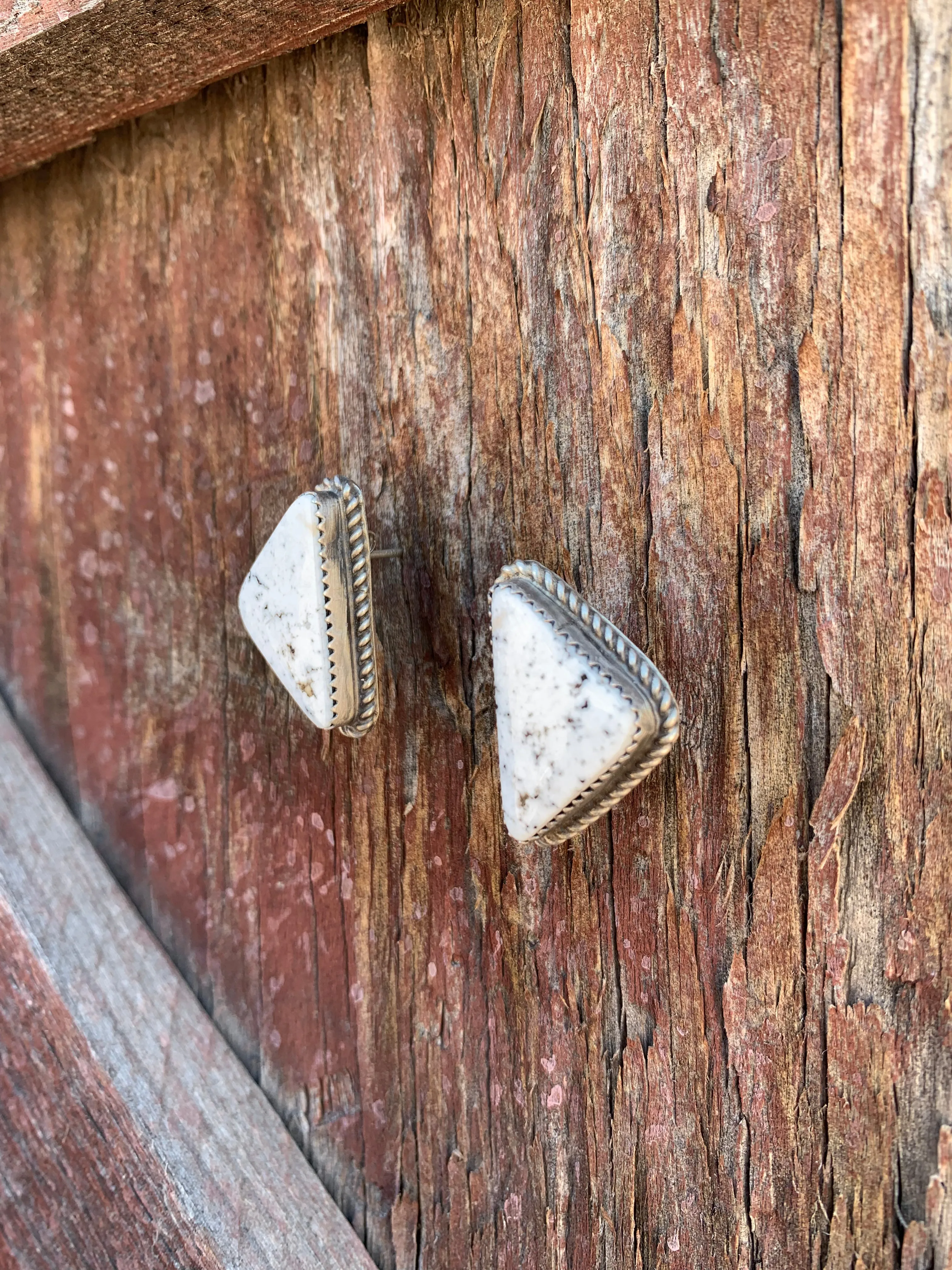 Triangle of White Buffalo stud earrings